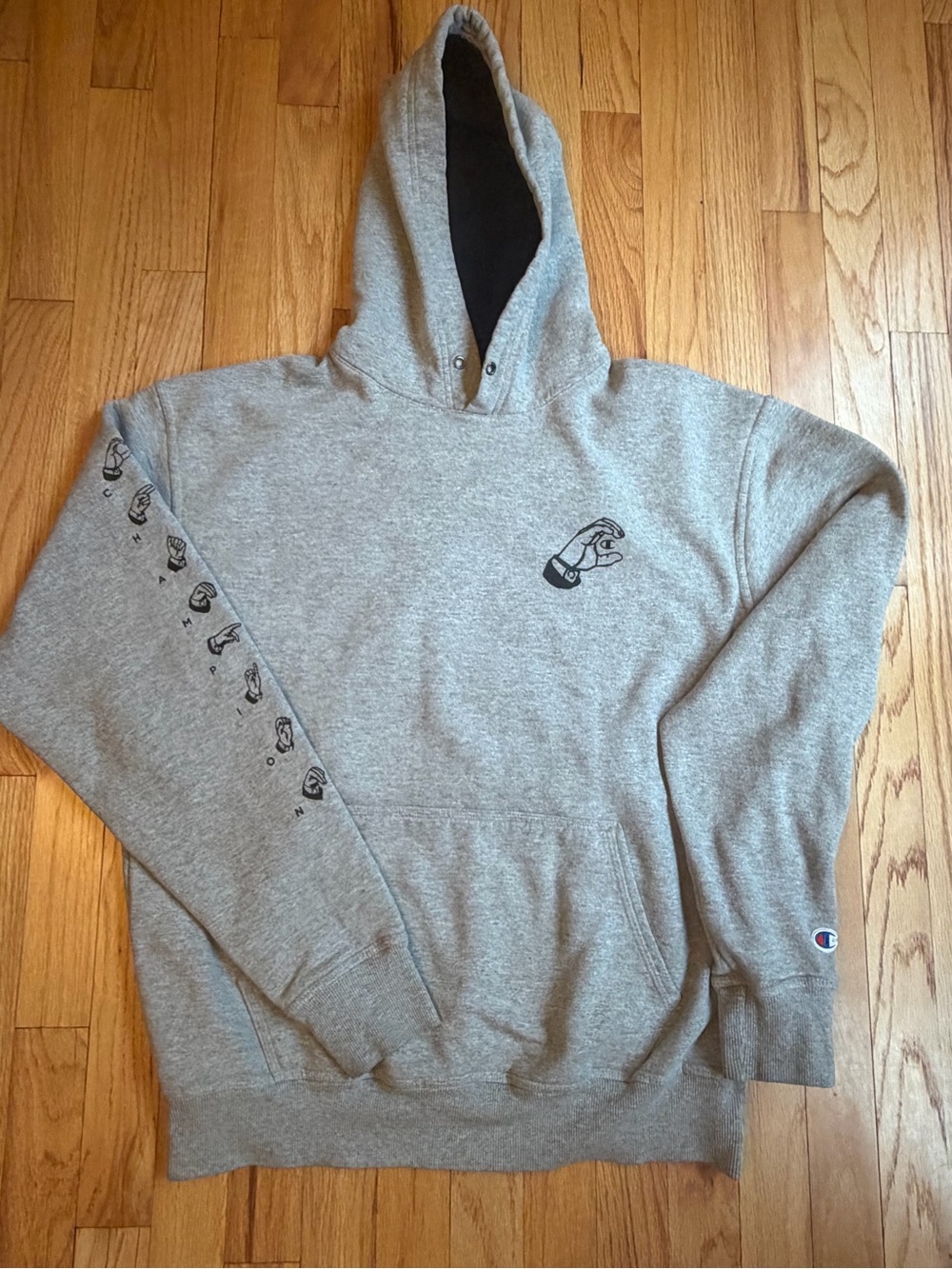 Champion Pullover Hoodie Sweatshirt with Sign Sleeve Graphic